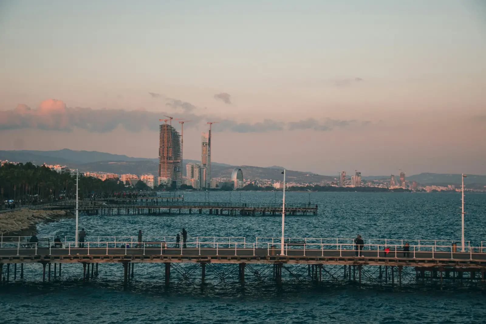 A seafront pier at sunset in Limassol, Cyprus